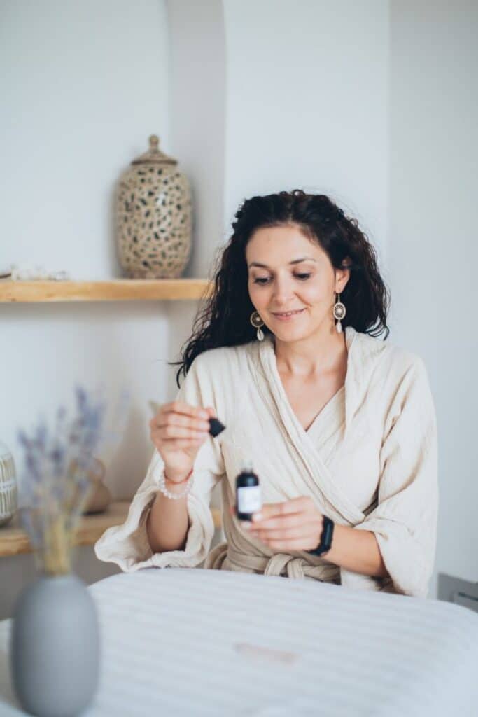 Lady using fragrant essential oil