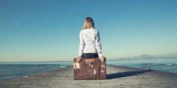 Emotional baggage definition-picture depicting a girl with emotional baggage