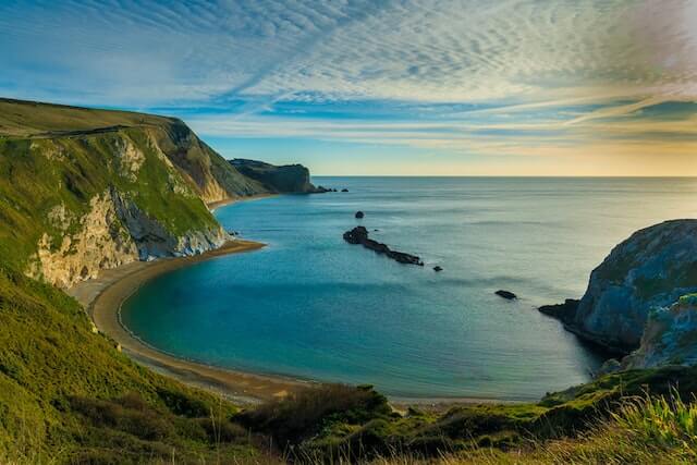 Early morning, overlooking a turquoise bay on the dorset coast.