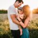 Family photo on green grass during golden hour-what is french parenting