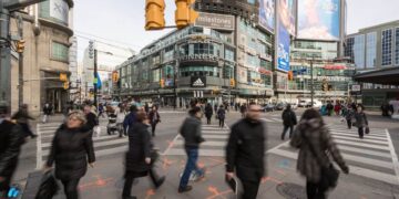 People walking in a busy crossroad-how to talk to strangers